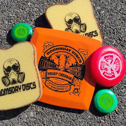 Doomsday Discs Oxymoron Cheese Sandwich Edition disc with Sharp Cheddar stamp